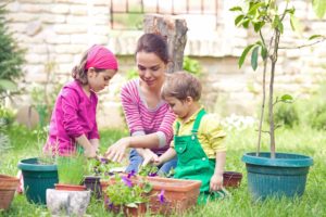 kids and mom gardening